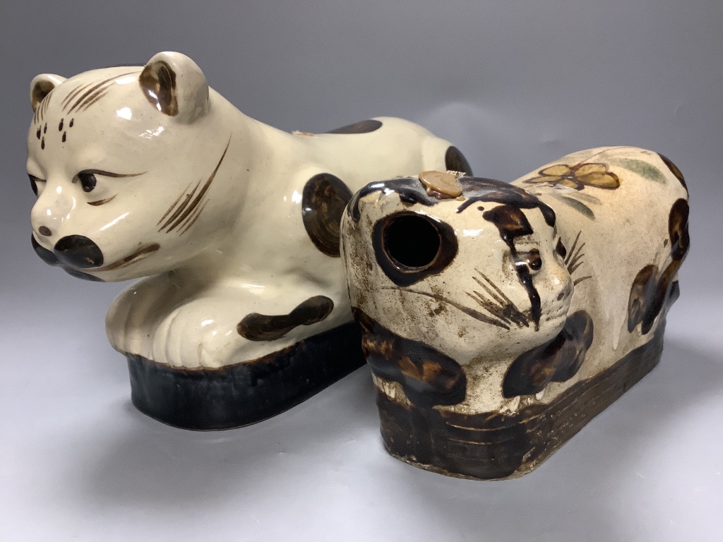 A 19th century Chinese Cizhou style 'cat' pillow and another later example, length 34cm